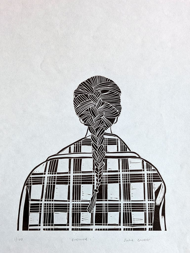 Lino print of a girl in a checked jacket, from the back, with a plait in her hair