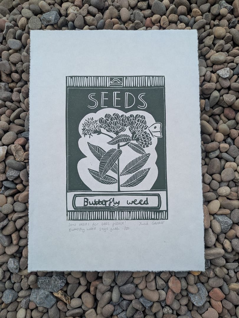 Lino print of butterfly weed seed packet by Julie Gardner