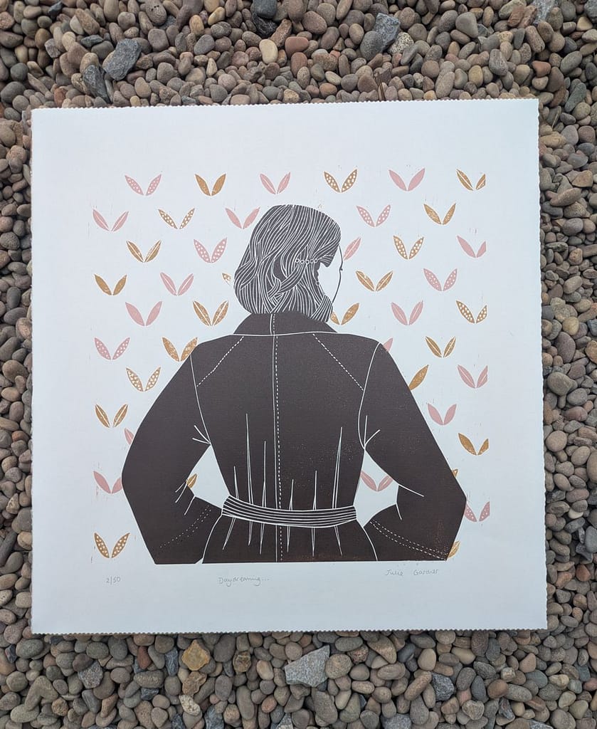 Daydreaming girl lino print by Julie Gardner